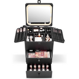 Black makeup case with open drawers filled with cosmetic products on a white background