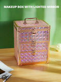 Shiny pink makeup box on a wooden surface with a green background
