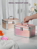 Small makeup case with metallic handle on a light surface with a blurred background