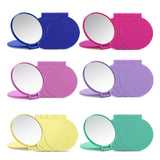 A set of various colored, round compact mirrors designed to be portable, with an additional small mirror for scale reference.