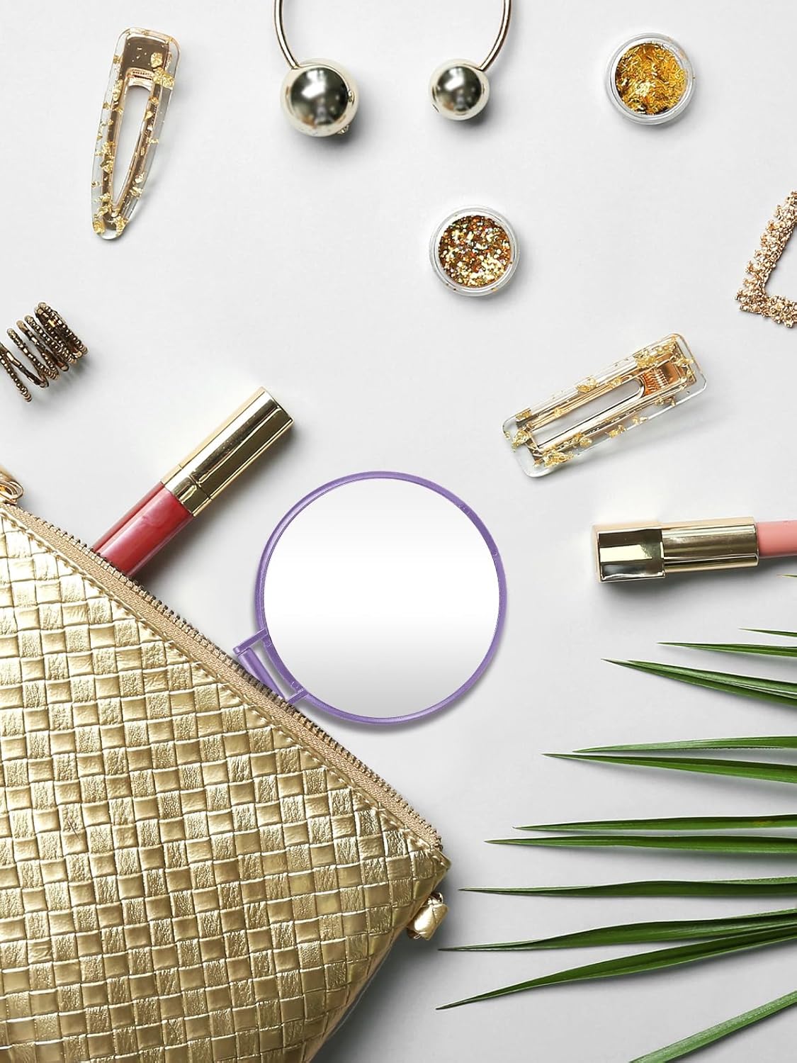 flatlay of beauty products on a white surface