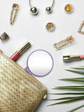 flatlay of beauty products on a white surface