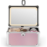 Pink makeup case with mirror and compartments on a white background